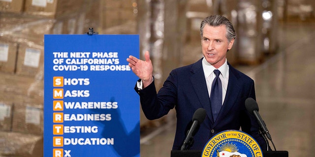 Gov. Gavin Newsom announces the next phase of Californias COVID-19 response called SMARTER, during a press conference at the UPS Healthcare warehouse in Fontana on Thursday, Feb. 17, 2022.  (Photo by Watchara Phomicinda/MediaNews Group/The Press-Enterprise via Getty Images)