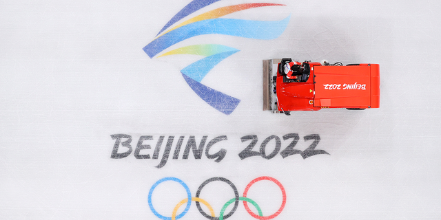 Ice-cleaning machines prepare the surface at the Capital Indoor Stadium in Beijing, China. 