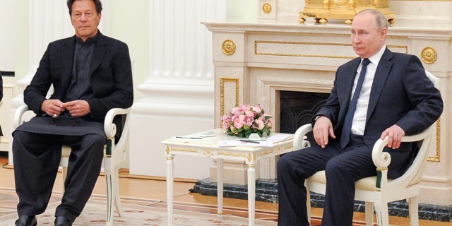 Pakistan's Prime Minister Imran Khan, left, and Russia's President Vladimir Putin meet at the Kremlin in Moscow, Feb. 24, 2022.