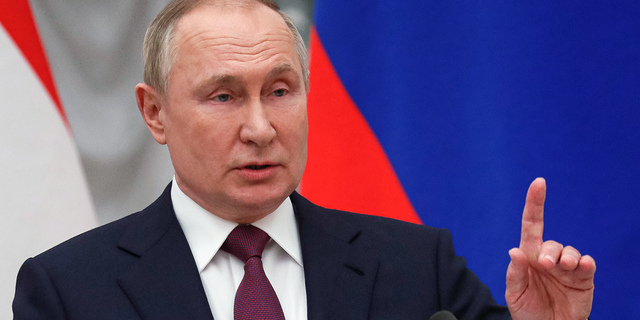 Russian President Vladimir Putin gestures while speaking to the media during a joint news conference with Hungary's Prime Minister Viktor Orban U.S. and NATO's response to the Russian security demands received last week. (Yuri Kochetkov/Pool Photo via AP)