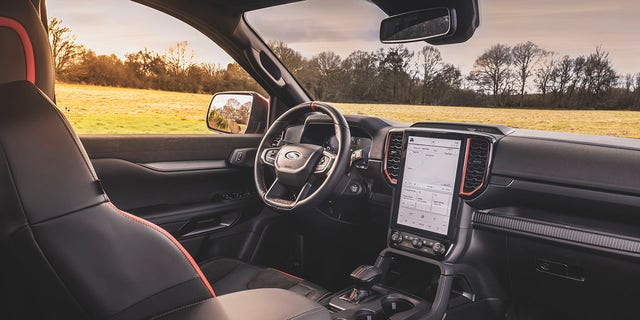 The Ranger Raptor's interior features a large central display.