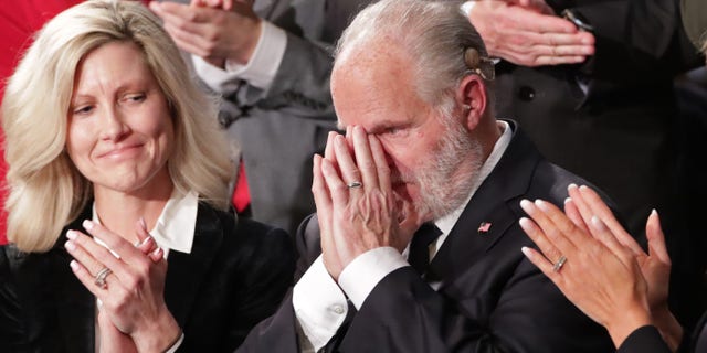 Conservative radio talk show host Rush Limbaugh reacts as he is awarded the Presidential Medal of Freedom during President Donald Trump's State of the Union address to a joint session of Congress in the House Chamber of the U.S. Capitol in Washington on Feb. 4, 2020. 