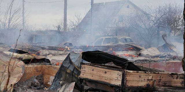 The debris of a privet house in the aftermath of Russian shelling outside Kyiv, Ukraine, Thursday, Feb. 24, 2022. Russia on Thursday unleashed a barrage of air and missile strikes on Ukrainian facilities across the country.