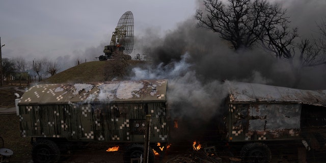 Smoke rise from an air defence base in the aftermath of an apparent Russian strike in Mariupol, Ukraine, Thursday, Feb. 24, 2022. Russian troops have launched their anticipated attack on Ukraine. Big explosions were heard before dawn in Kyiv, Kharkiv and Odesa as world leaders decried the start of Russian invasion that could cause massive casualties and topple Ukraine's democratically elected government. (WHD Photo/Evgeniy Maloletka)
