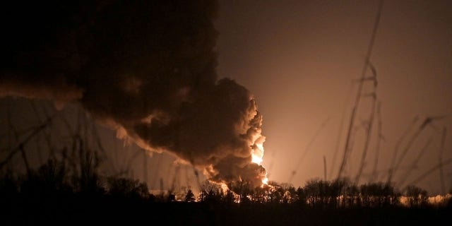 A view shows a burning oil depot reportedly hit by shelling near the military airbase Vasylkiv in the Kyiv region, Ukraine Feb. 27, 2022. 