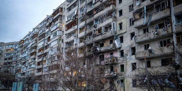 View of a damaged building following a rocket attack in the city of Kyiv, Ukraine, Friday, February 25, 2022.