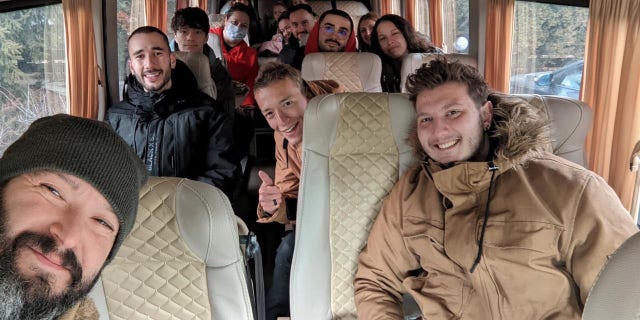 The first wave of Americans and lawful residents who escaped Kyiv on Thursday.