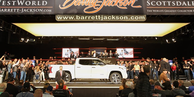 The first Toyota Tundra with an i-Force Max hybrid powertrain was auctioned at Barrett-Jackson for $700,000 to raise money for charity.
