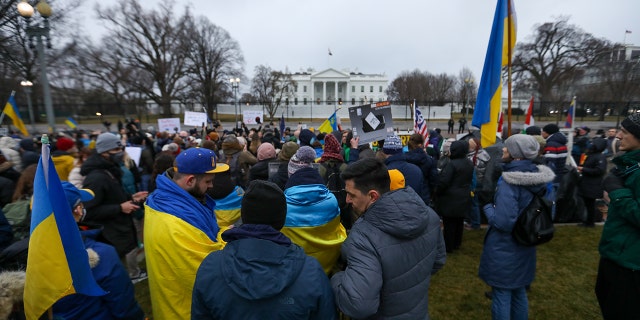 WASHINGTON, USA - FEBRUARY 24: Ukrainians gather in front of the White House in Washington, USA to stage a protest against Russia's attack in Ukraine on February 24, 2022.