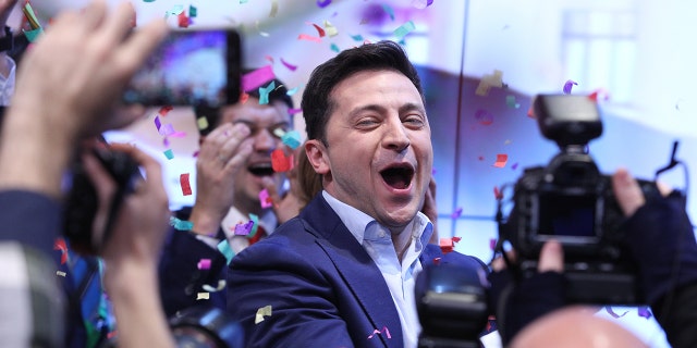 Ukrainian comedian and presidential candidate Volodymyr Zelenskiy smiles after the second round of presidential elections in Kiev, Ukraine, Sunday, April 21, 2019.