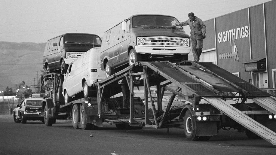 Chowchilla vans in a black and white image