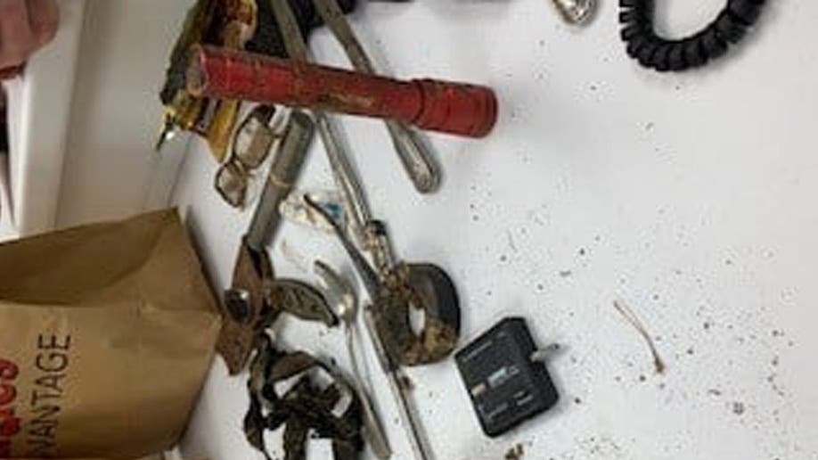 Items found near the remains of an unidentified man in Cherokee County, North Carolina.