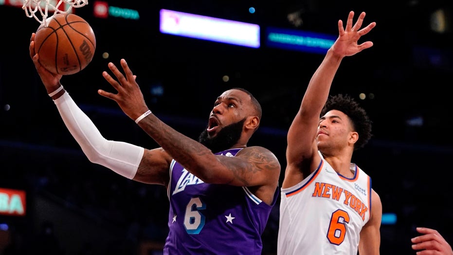 LeBron James returns with triple-double, Lakers beat Knicks in OT
