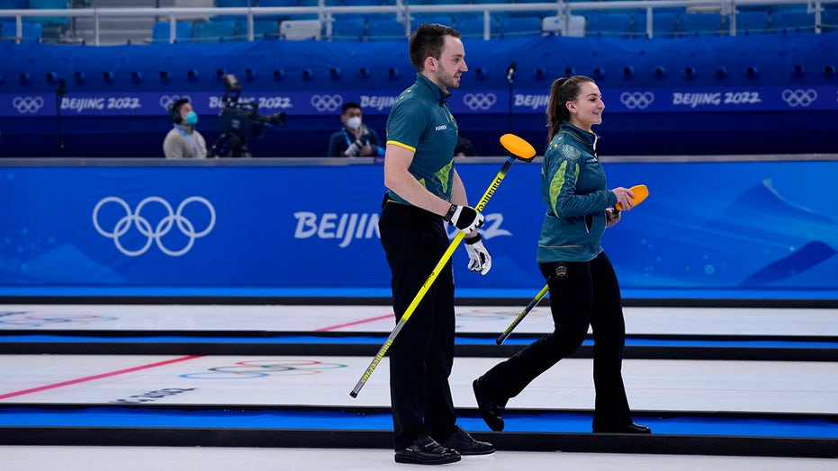 Aussies curlers out of Olympics after positive COVID test, back in, then win 1st game