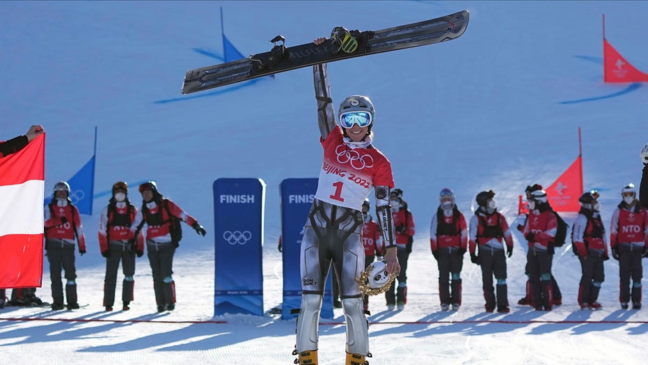 Ester Ledecka defends Olympic snowboard PGS title, ski racing next