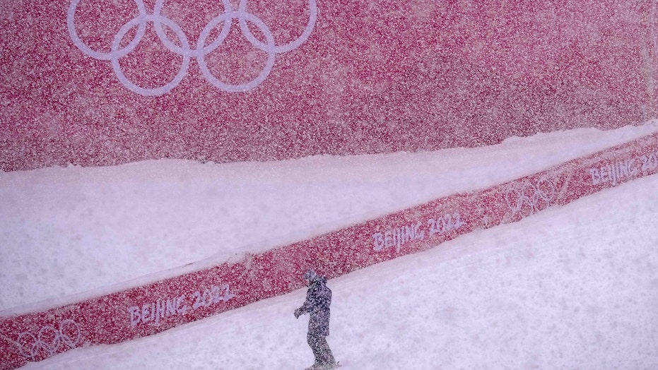Olympic Skiers struggle as real snow falls on Beijing