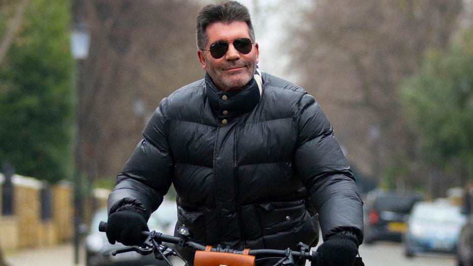 Simon Cowell ‘doing well,’ ‘healing at home’ with broken arm following