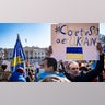People participate in a pro-Ukrainian protest in Lafayette Park near the White House on February 27, 2022 in Washington, DC. Many U.S. cities have seen rallies in support of Ukraine over the weekend as the invasion by Russian forces continues.