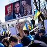 People participate in a pro-Ukrainian protest in Lafayette Park near the White House on February 27, 2022 in Washington, DC. Many U.S. cities have seen rallies in support of Ukraine over the weekend as the invasion by Russian forces continues.
