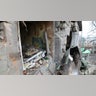 Damaged building is seen in Donetsk's Petrovskaya, which is under control of pro-Russian separatists, as Russian attacks continue in Ukraine on February 28, 2022.