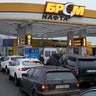 Vehicles line up to a gasoline station in Kyiv, Ukraine, Thursday, Feb. 24, 2022.
