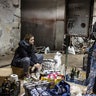 Volunteers work to make molotov cocktails in the basement of a bomb shelter on February 26, 2022 in Kyiv, Ukraine. Explosions and gunfire were reported around Kyiv on the second night of Russia's invasion of Ukraine, which has killed scores and prompted widespread condemnation from US and European leaders.