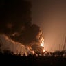 A view shows a burning oil depot reportedly hit by shelling near the military airbase Vasylkiv in the Kyiv region, Ukraine February 27, 2022. REUTERS/Maksim Levin