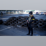 Civil defense personnel man a checkpoint in Kyiv, Ukraine, Saturday, Feb. 26, 2022.