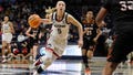 Connecticuts Paige Bueckers (5) drives to the basket during the first half of a first-round womens college basketball game against Mercer in the NCAA tournament, Saturday, March 19, 2022, in Storrs, Conn.
