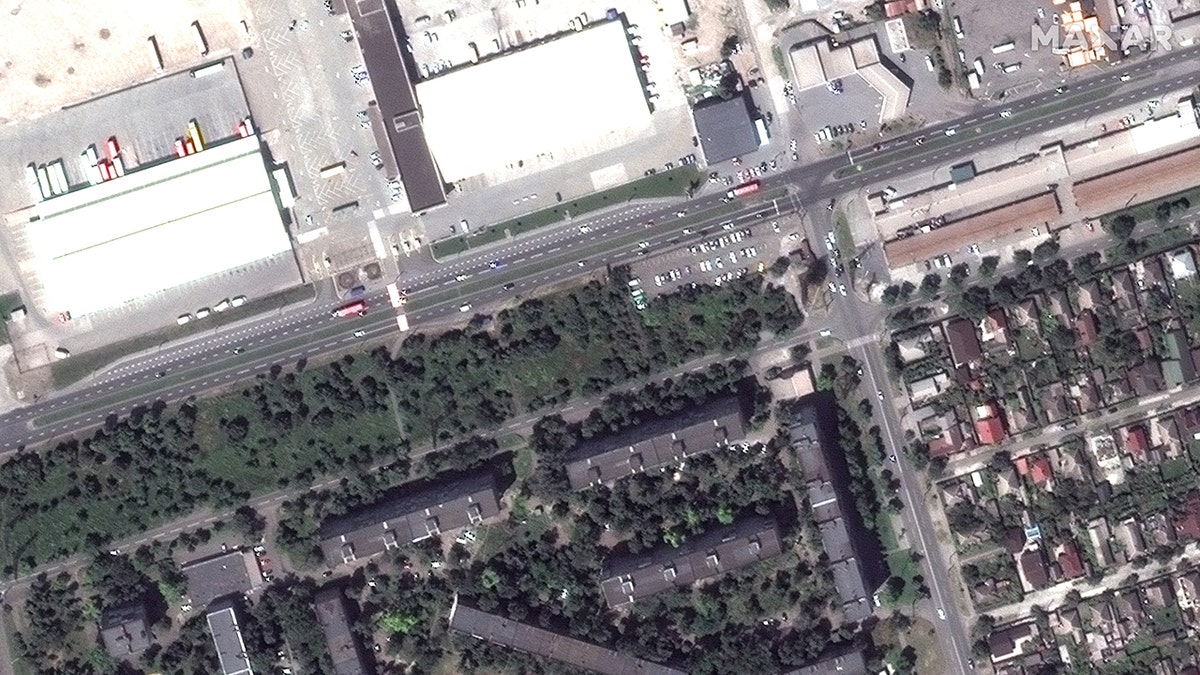 Before/after views of apartment buildings and damage in area, Zhovteneyvi district (Location: 47.107, 37.509)