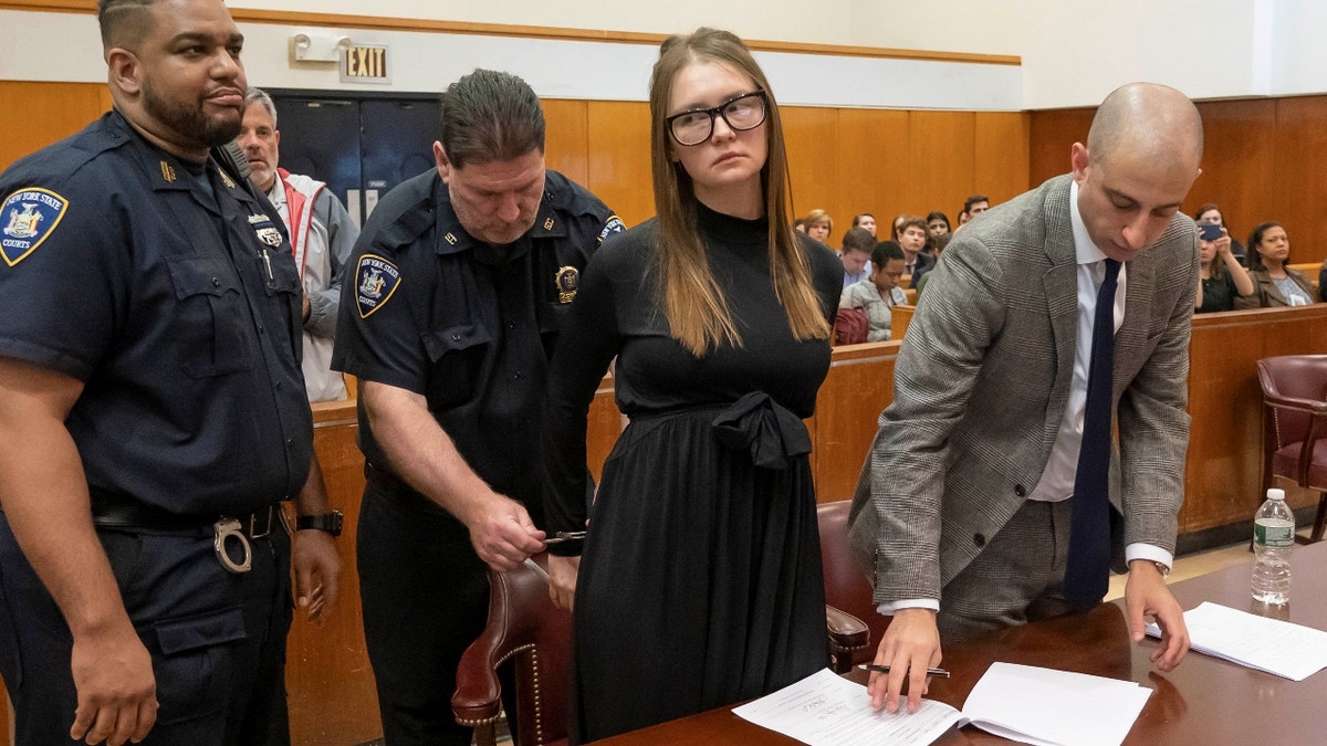 Anna Sorokin, who a New York jury convicted last month of swindling more than $200,000 from banks and people, reacts during her sentencing at Manhattan State Supreme Court New York, U.S., May 9, 2019. Steven Hirsch/Pool via REUTERS