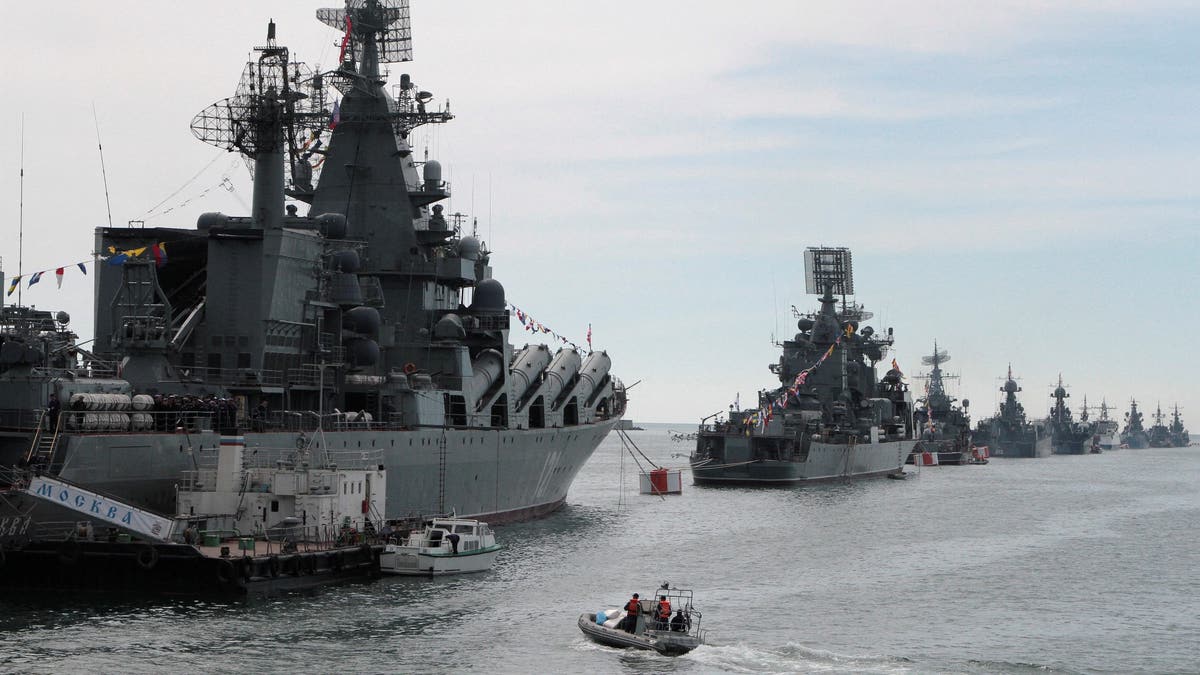 FILE PHOTO: Russian Navy vessels are anchored in a bay of the Black Sea port of Sevastopol