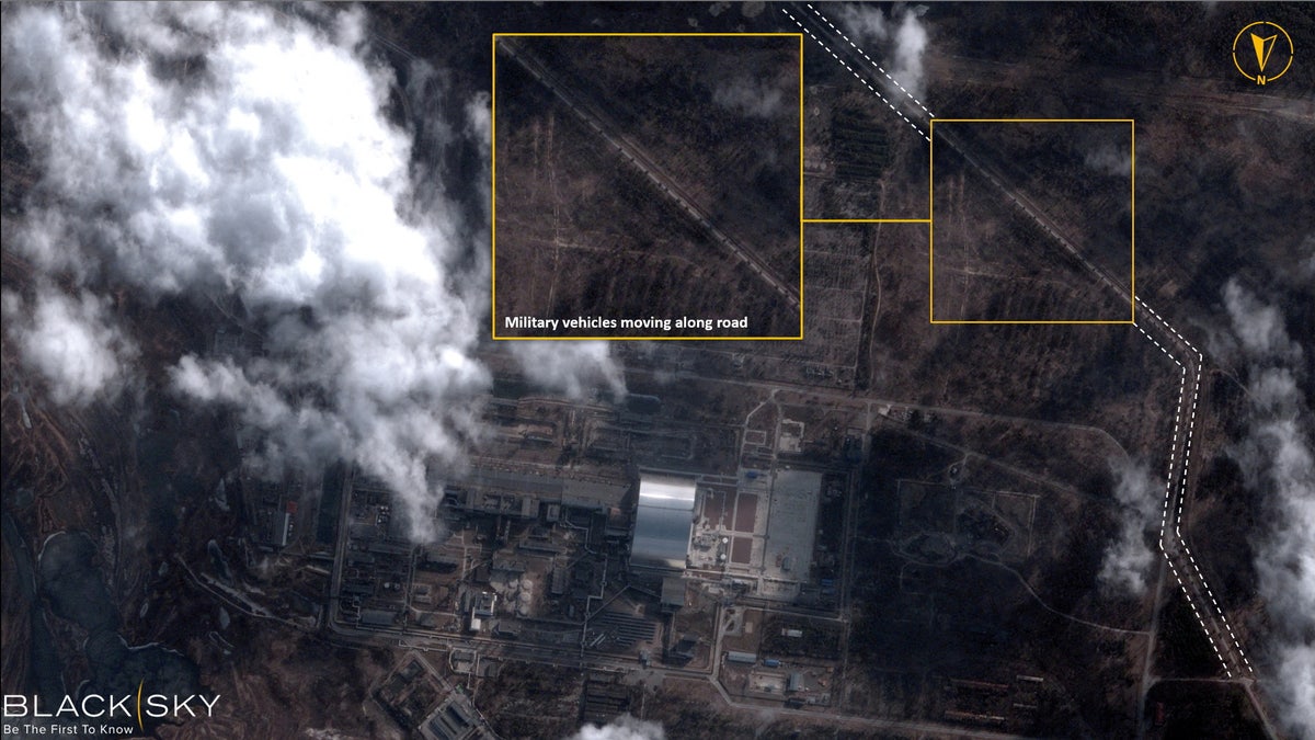 A satellite image with overlaid graphics shows military vehicles alongside Chernobyl Nuclear Power Plant, in Chernobyl, Ukraine February 25, 2022. Picture taken February 25, 2022.