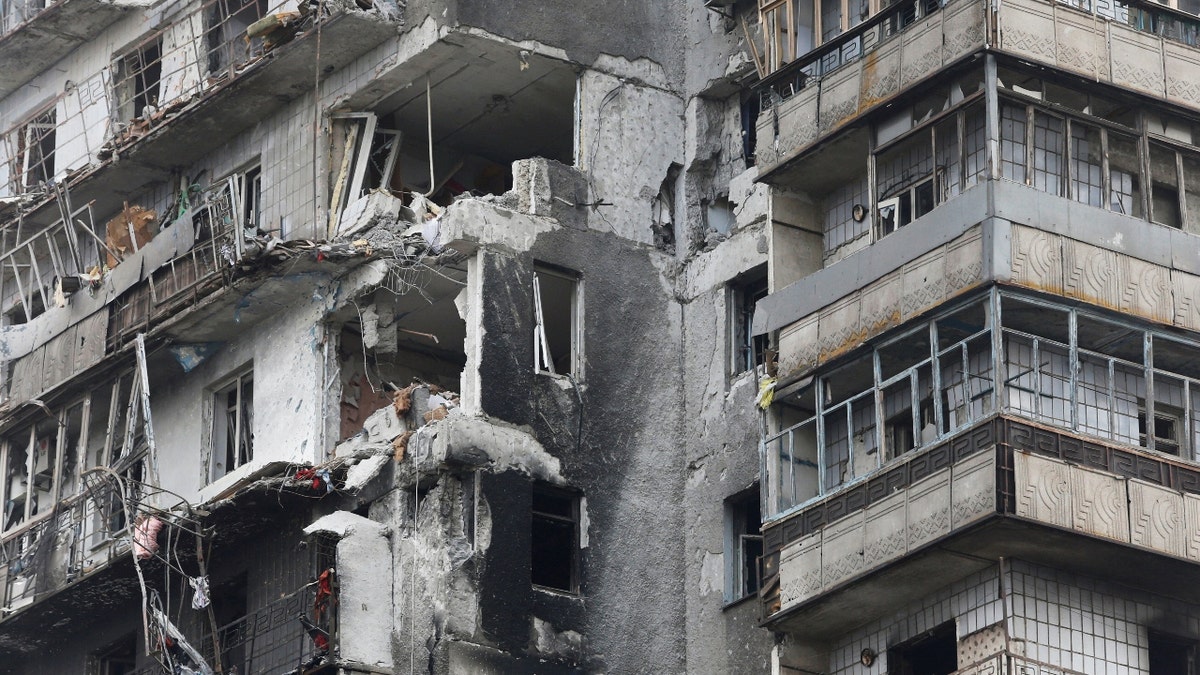 A view shows a residential building which was damaged during Ukraine-Russia conflict in the besieged southern port city of Mariupol, Ukraine March 18, 2022. REUTERS/Alexander Ermochenko/File Photo