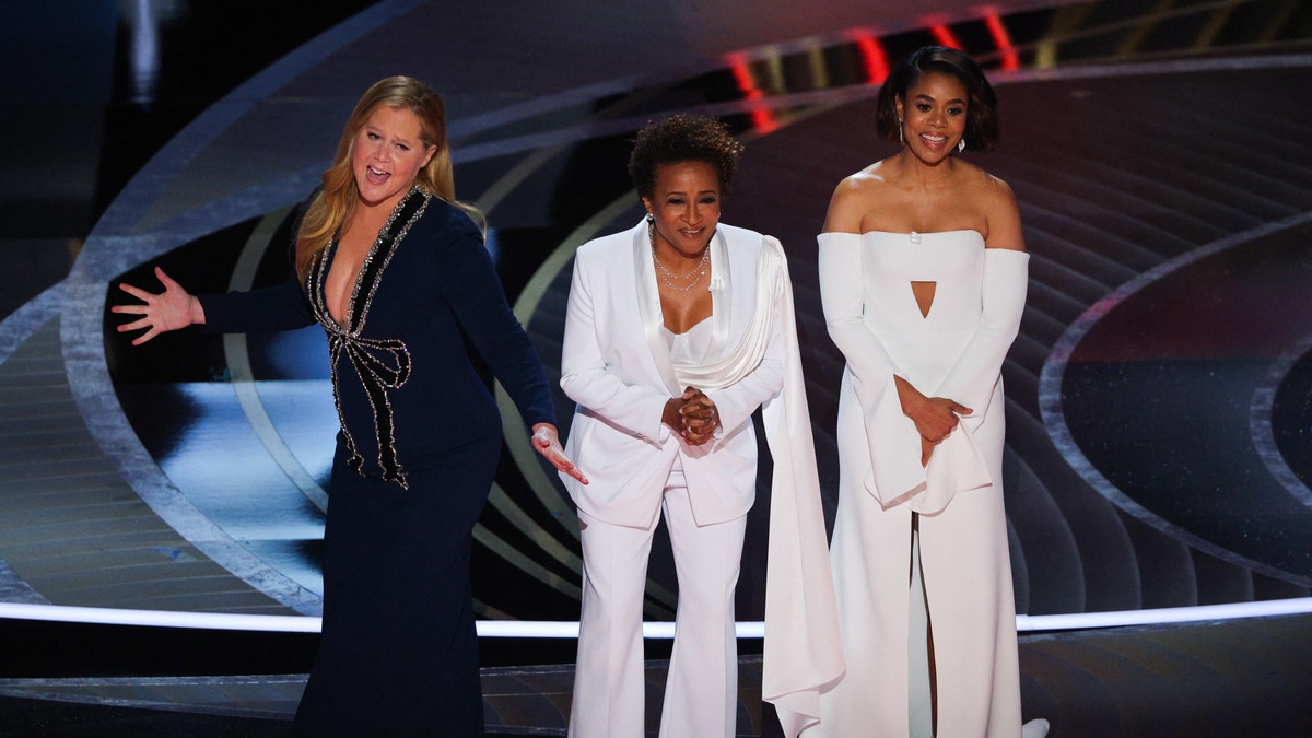 Hosts Regina Hall, Amy Schumer and Wanda Sykes begin the show at the 94th Academy Awards in Hollywood, Los Angeles, California, U.S., March 27, 2022. REUTERS/Brian Snyder