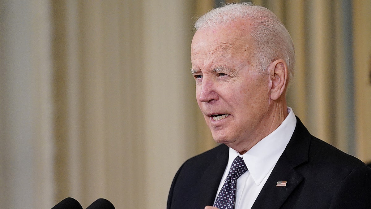 Biden speaking at podium