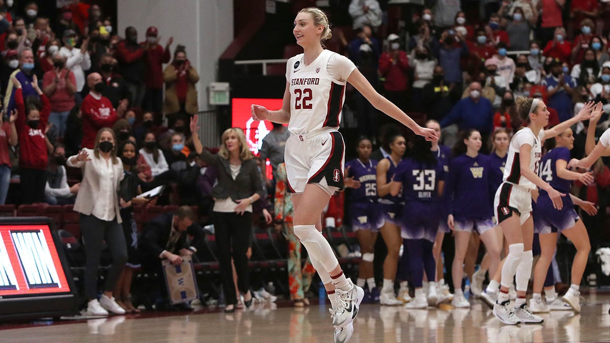 Stanford forward Cameron Brink (22) celebrates a victory in an NCAA college basketball game against Washington, Saturday, Feb. 26, 2022, in Stanford, Calif