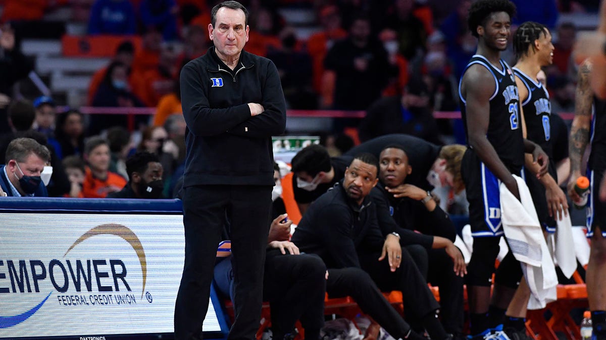 Duke coach Mike Krzyzewski watches from the sideline during the second half of the team's NCAA college basketball game against Syracuse in Syracuse, N.Y., Saturday, Feb. 26, 2022. Duke won 97-72.
