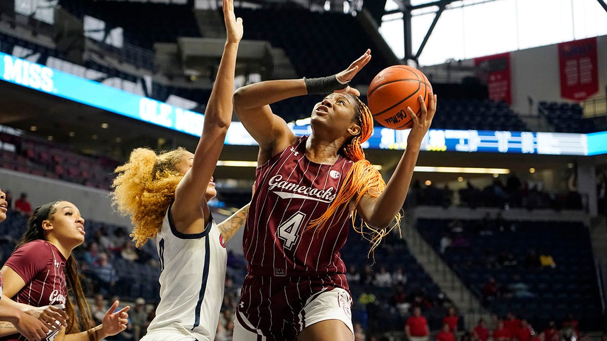 South Carolina forward Aliyah Boston (4) shoots over Mississippi forward Shakira Austin (0) during the first half of an NCAA college basketball game in Oxford, Miss., Sunday, Feb. 27, 2022. South Carolina won 71-57.