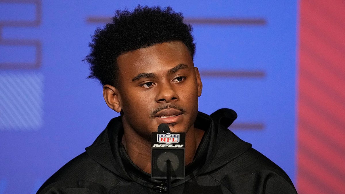 Liberty quarterback Malik Willis speaks during a press conference at the NFL football scouting combine, Wednesday, March 2, 2022, in Indianapolis.