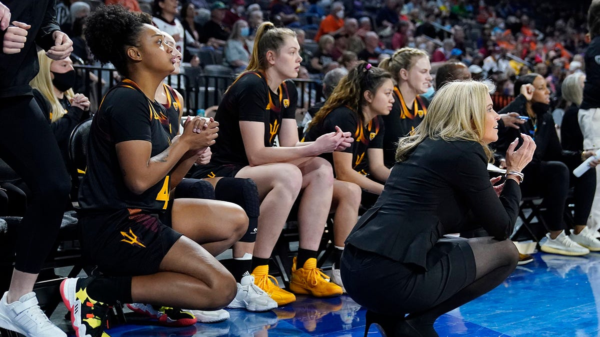 Arizona State head coach Charli Turner Thorne, right, reacts with her team during the second half of an NCAA college basketball game against the Oregon State in the first round of the Pac-12 women's tournament Wednesday, March 2, 2022, in Las Vegas.