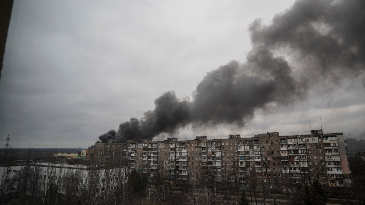 Smoke rises after shelling by Russian forces in Mariupol, Ukraine, Friday, March 4, 2022.(AP Photo/Evgeniy Maloletka)