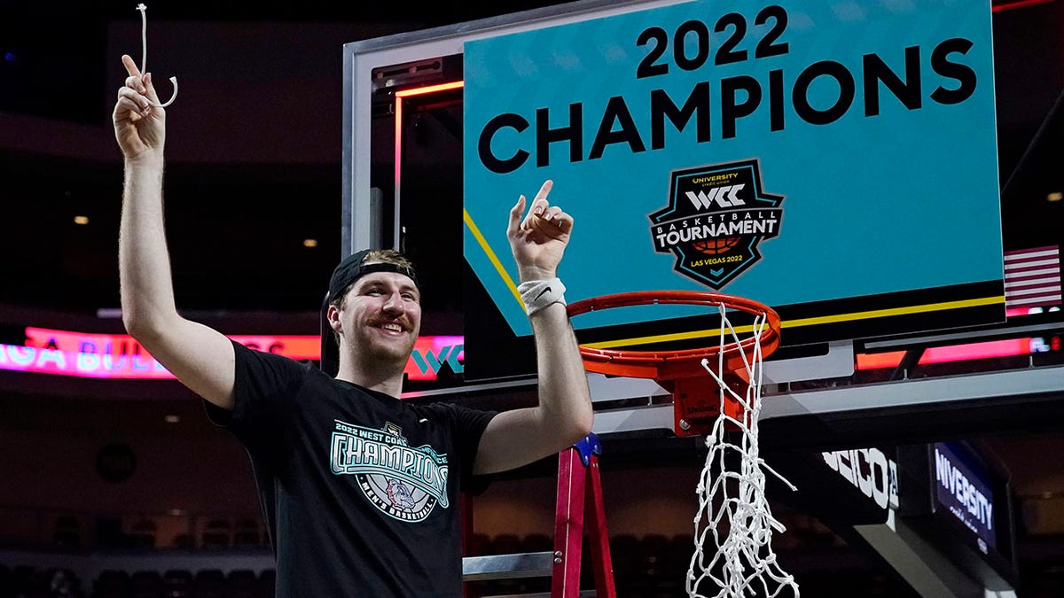 Gonzaga's Drew Timme (2) celebrates after cutting a piece of the net after Gonzaga defeated Saint Mary's in an NCAA college basketball championship game at the West Coast Conference tournament Tuesday, March 8, 2022, in Las Vegas.