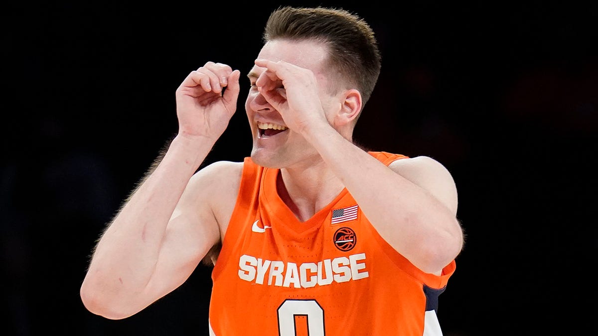 Syracuse's Jimmy Boeheim (0) reacts after scoring in the first half of an NCAA college basketball game against Florida State during the Atlantic Coast Conference men's tournament, Wednesday, March 9, 2022, in New York.