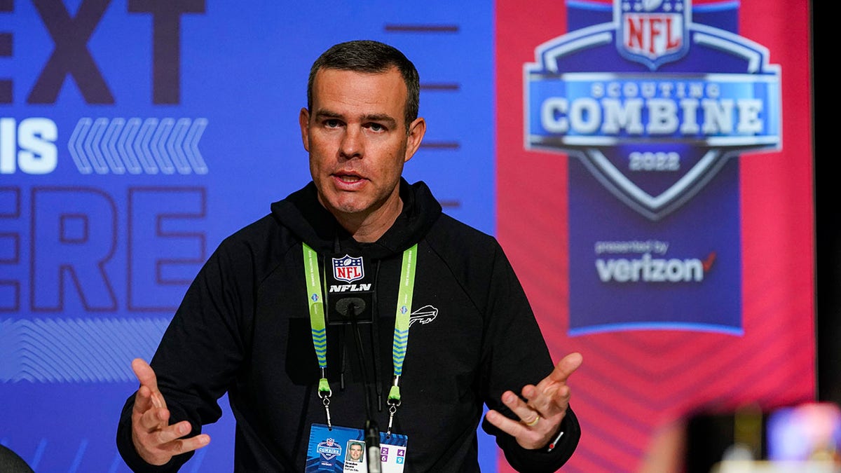 FILE - Buffalo Bills general manager Brandon Beane speaks during a press conference at the NFL football scouting combine in Indianapolis, Tuesday, March 1, 2022. Beane has a decision to weigh as to whether to stick with the players he’s familiar with or plug the team’s needs in free agency, and with little room to maneuver under the salary cap.