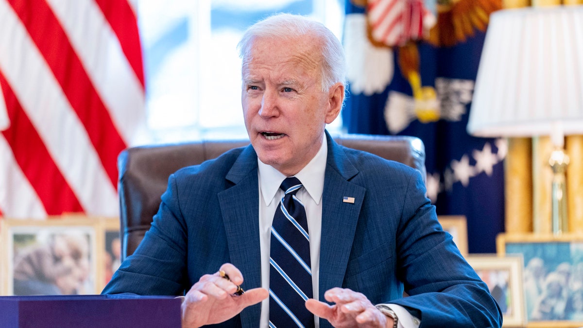 President Biden speaks before signing the American Rescue Plan, a coronavirus relief package, in the Oval Office of the White House, March 11, 2021, in Washington.