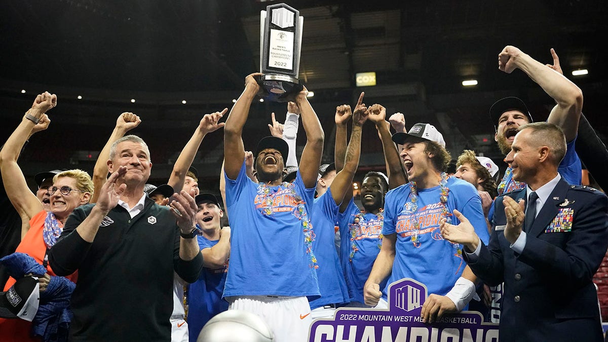 Boise State players celebrate their victory over San Diego State after an NCAA college basketball game in the championship of Mountain West Conference men's tournament Saturday, March 12, 2022, in Las Vegas.