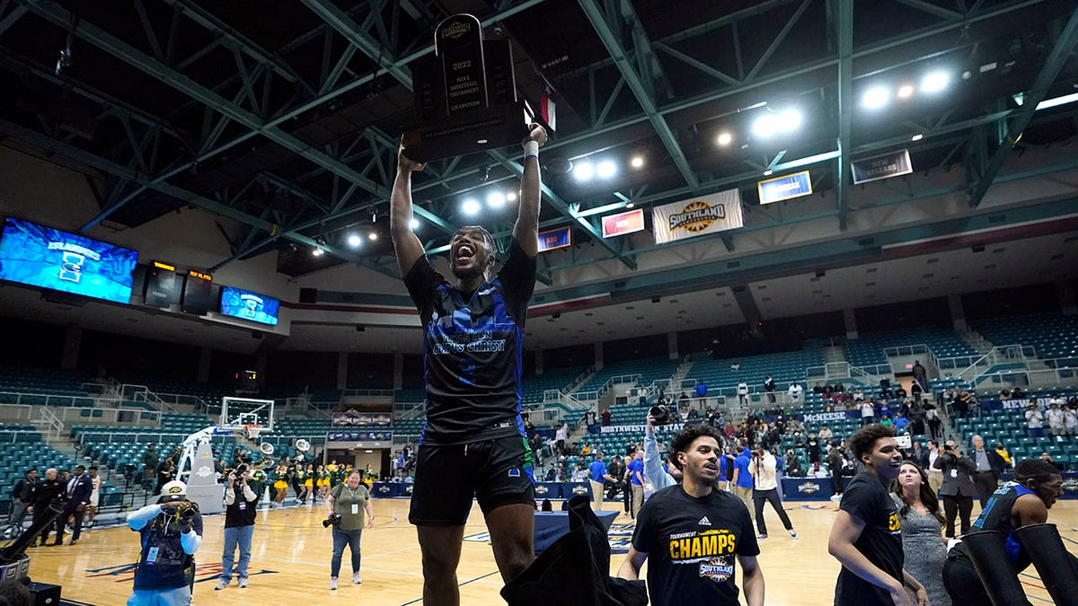 Texas A&amp;amp;M Corpus Christi's Myles Smith celebrates after the Southland Conference tournament NCAA college basketball game final against the Southeastern Louisiana Saturday, March 12, 2022, in Katy, Texas. Texas A&amp;amp;M Corpus Christi won 73-65.