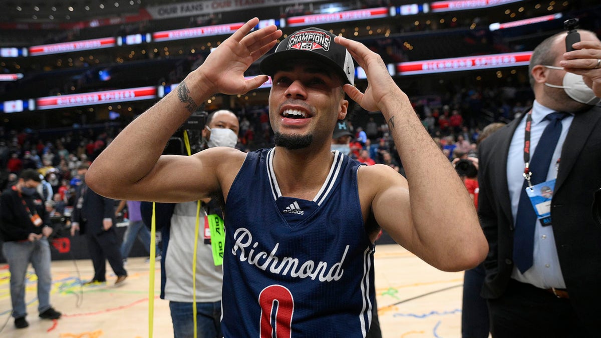 Richmond guard Jacob Gilyard (0) reacts after an NCAA college basketball game in the championship of the Atlantic 10 Conference tournament against Davidson, Sunday, March 13, 2022, in Washington.