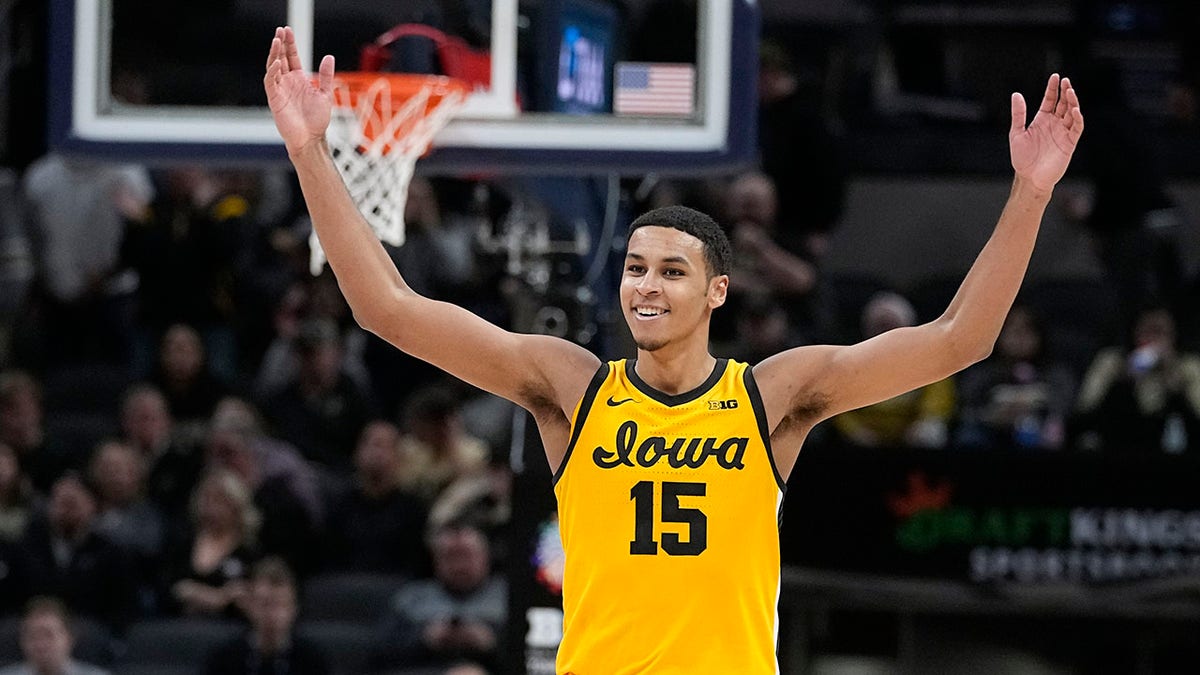 Iowa forward Keegan Murray celebrates at the end of an NCAA college basketball game against Purdue at the Big Ten Conference tournament, Sunday, March 13, 2022, in Indianapolis. Iowa won 75-66.
